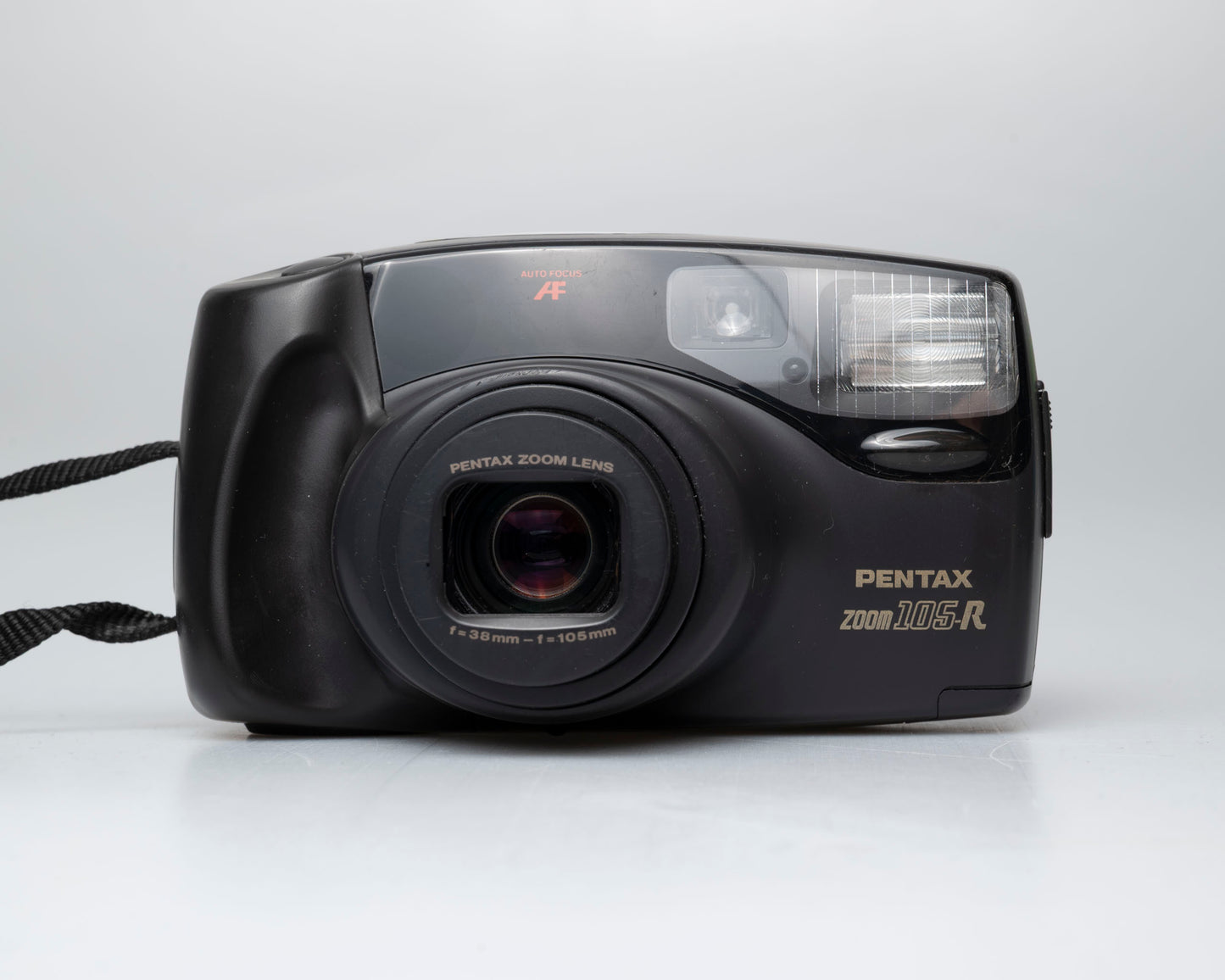 Black Pentax Zoom 105-r camera on a white background for sale at www.newwavepool.shop in Montreal, Canada