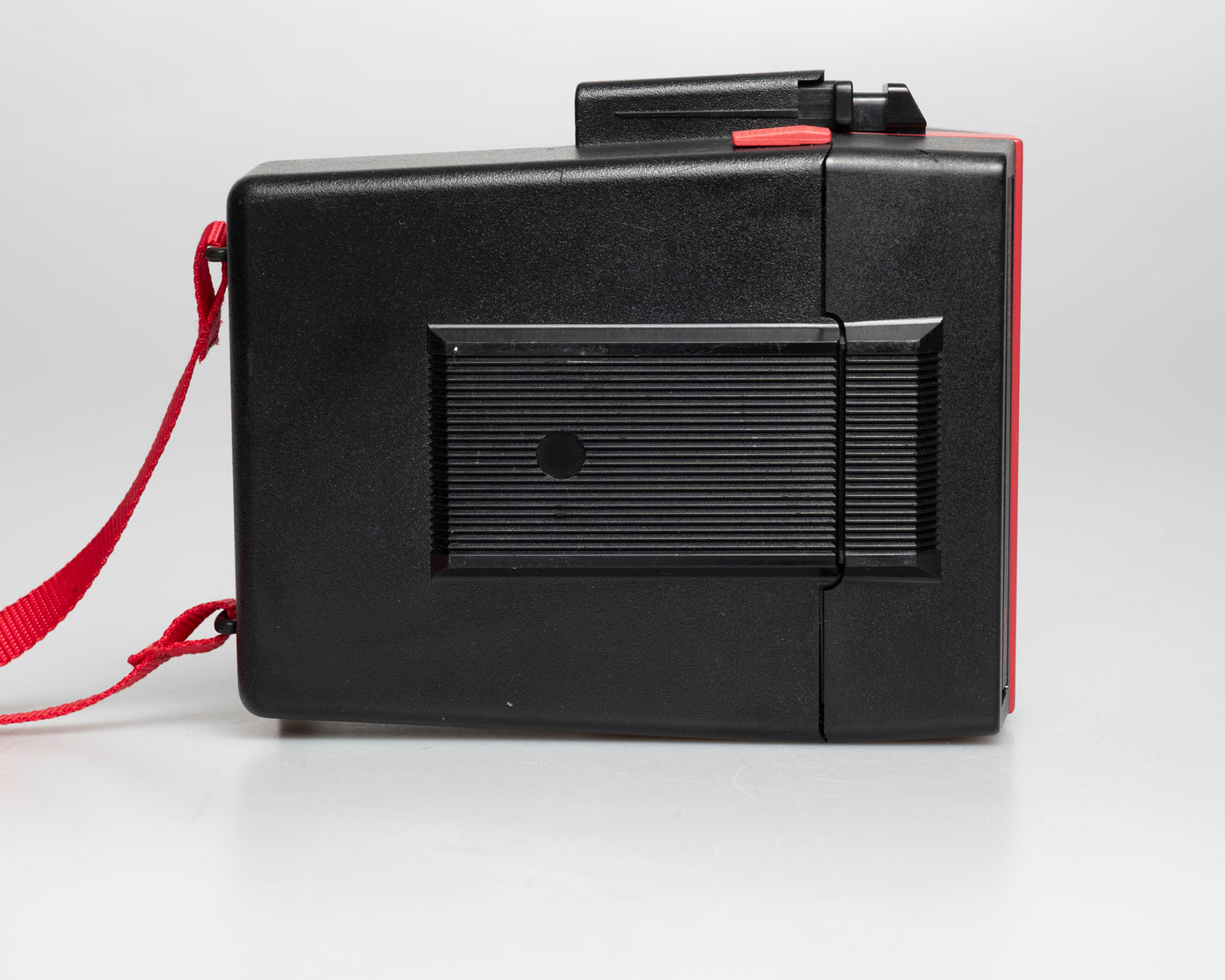 Red Polaroid 600 Cool Cam instant camera (serial J2R1064VJAC)