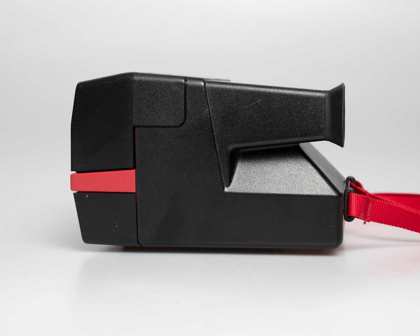 Red Polaroid 600 Cool Cam instant camera (serial J2R1064VJAC)