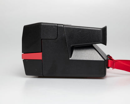 Red Polaroid 600 Cool Cam instant camera (serial J2R1064VJAC)