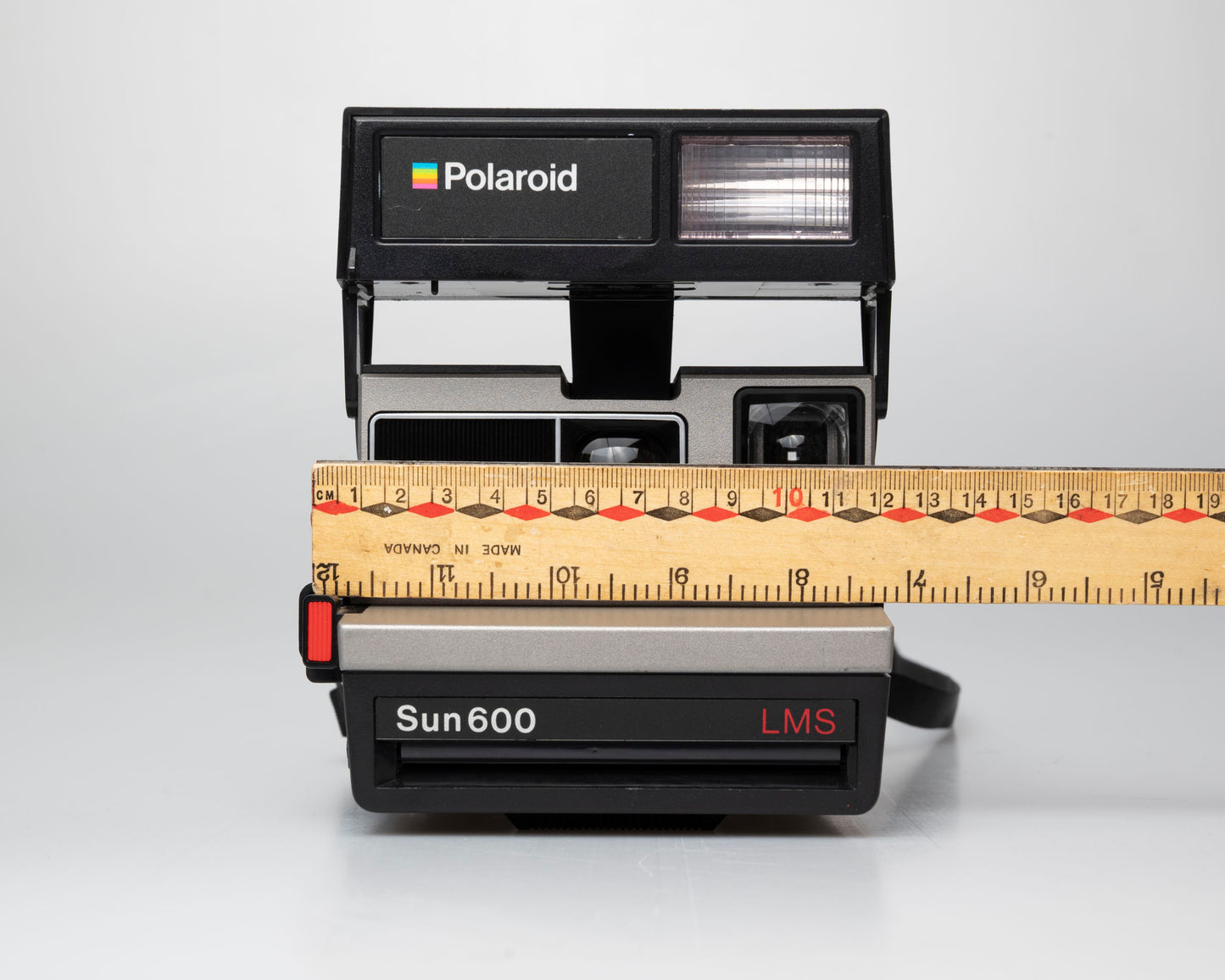 Polaroid Sun 600 LMS instant film camera (serial K4U58220NC) Made-in-USA version