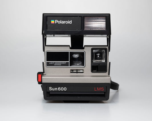 Polaroid Sun 600 LMS instant film camera (serial K4U58220NC) Made-in-USA version