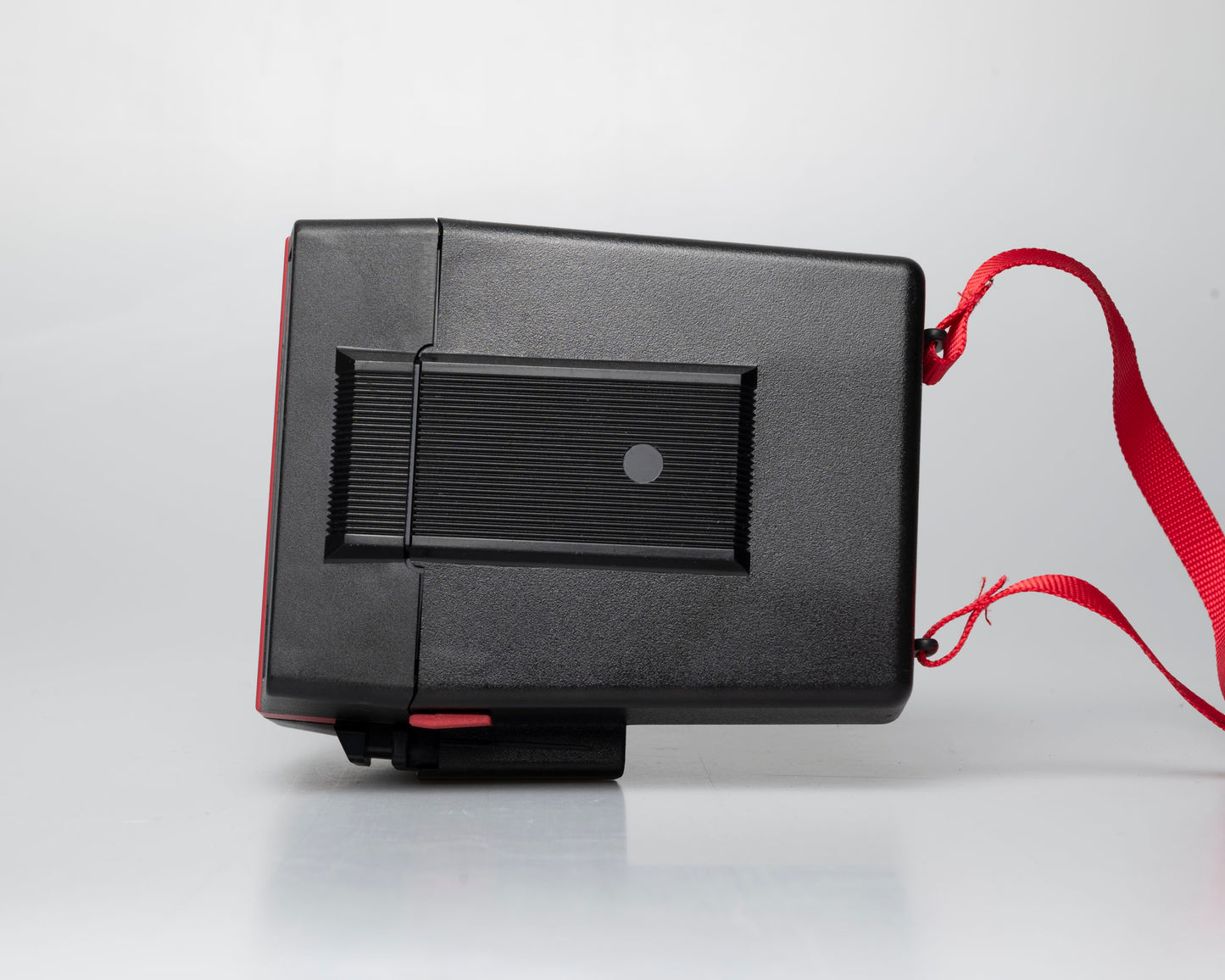 Red Polaroid 600 Cool Cam instant camera (serial F2B0850HVAC)