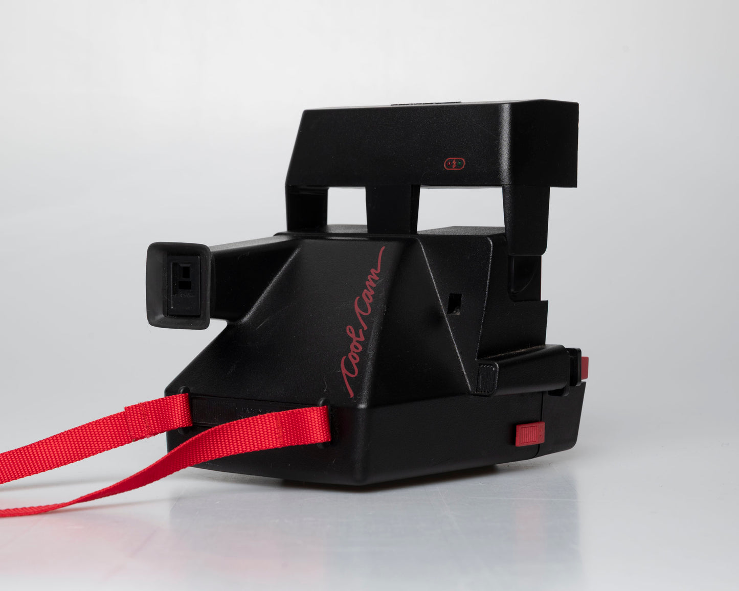 Red Polaroid 600 Cool Cam instant camera (serial F2B0850HVAC)