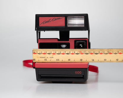 Red Polaroid 600 Cool Cam instant camera (serial F2B0850HVAC)