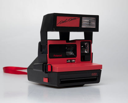 Red Polaroid 600 Cool Cam instant camera (serial F2B0850HVAC)