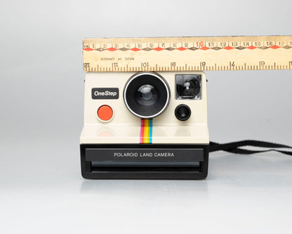 Polaroid One Step (original) uses SX-70 instant film (serial