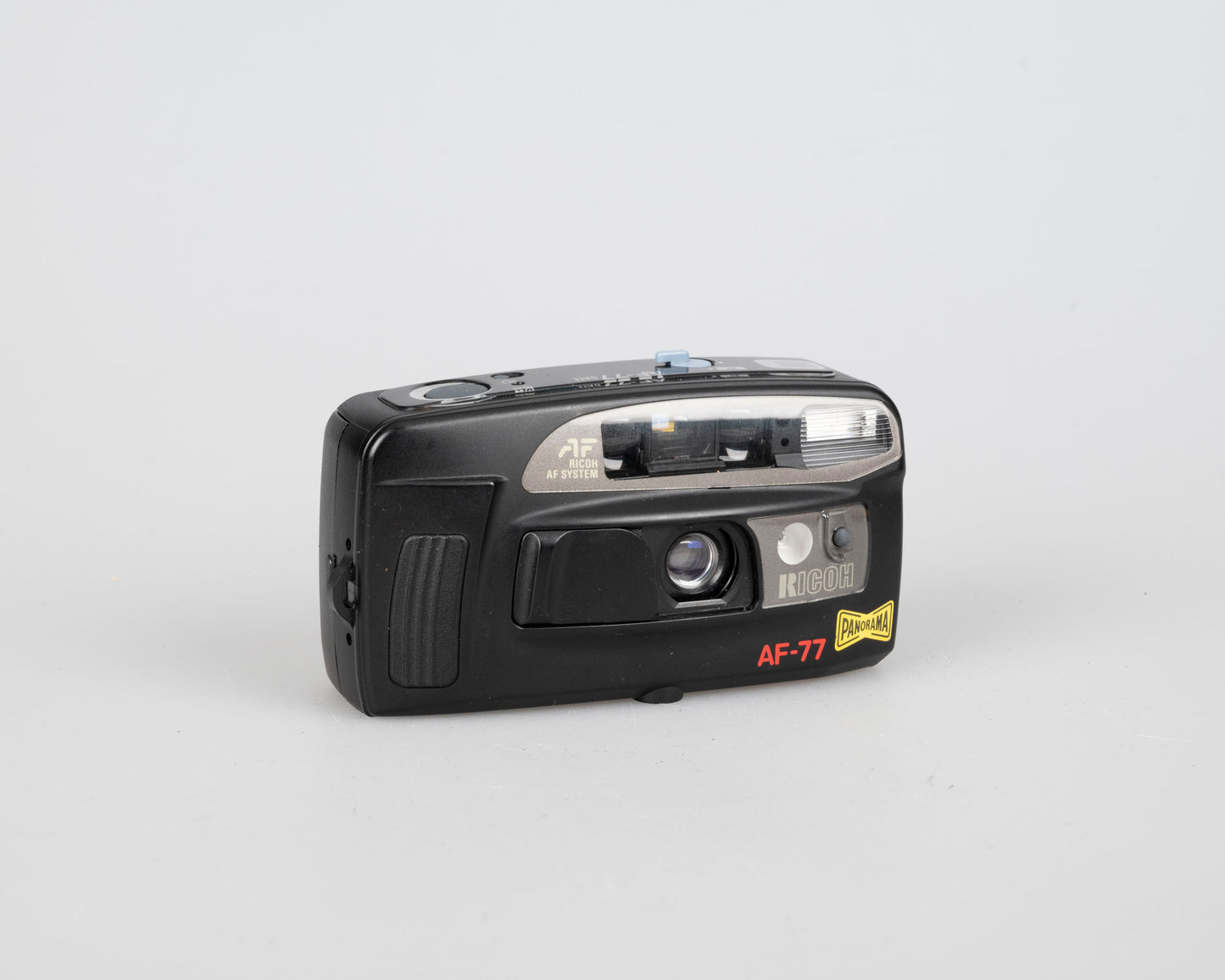 Ricoh AF-77 35mm camera w/ case (serial 142029)