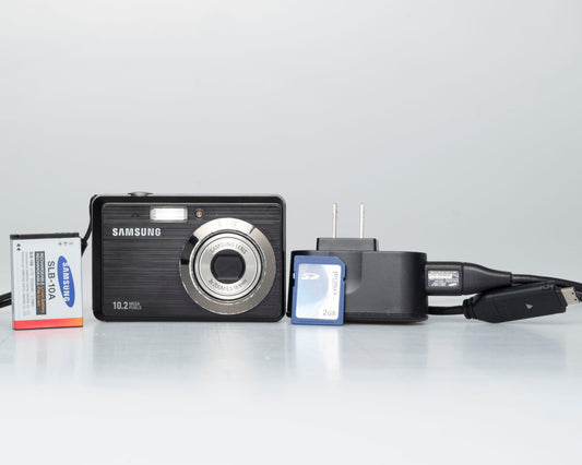 Samsung SL102 10.2 MP CCD sensor digicam w/ 2GB SD card + battery + charger (serial A1V3C908B0187L))