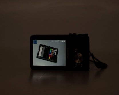 Samsung WB550 12MP digicam w/ 8GB SD card + battery + charger (serial A2CCC90SB01804F)