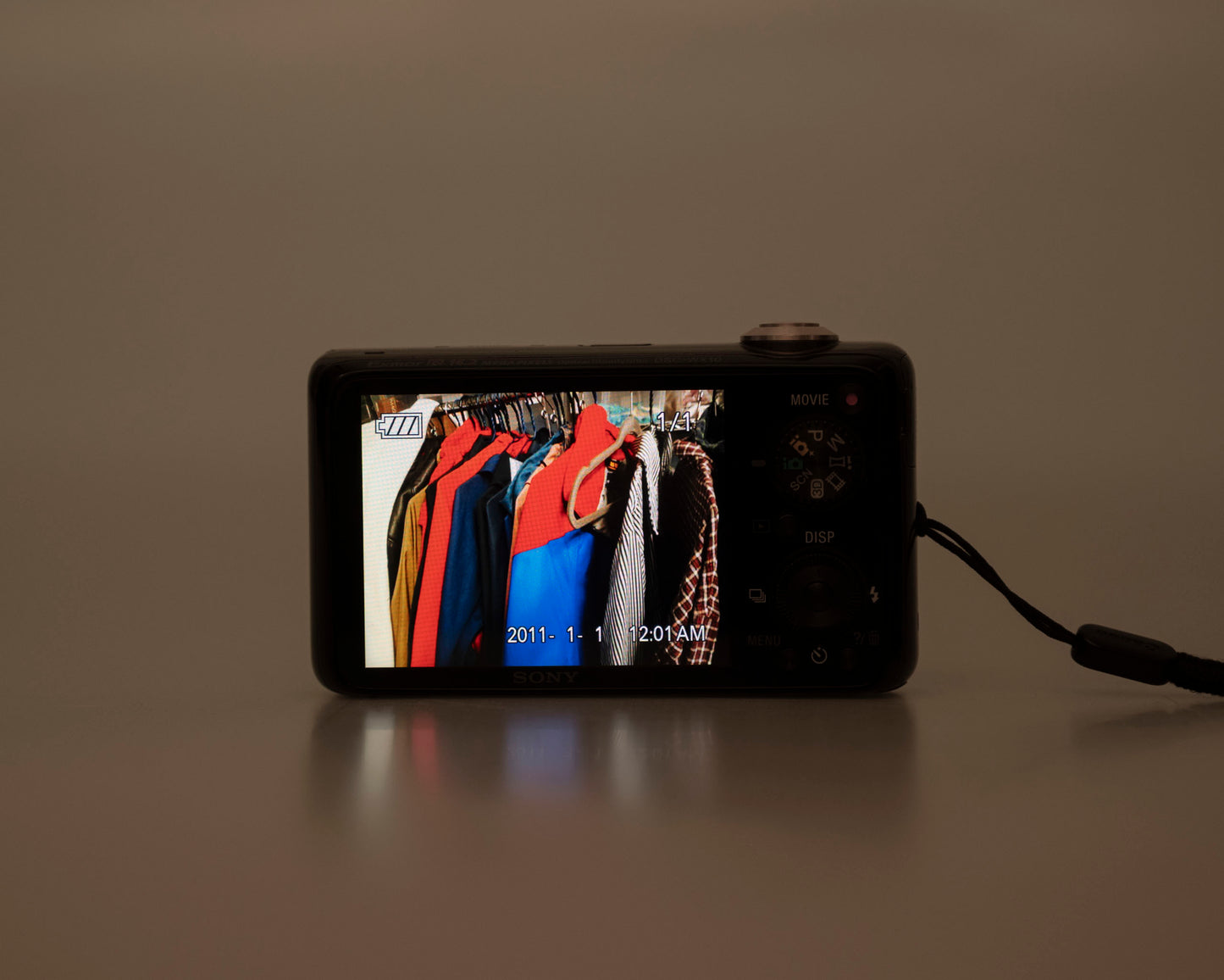 Sony Cyber-Shot G DSC-WX10 16.2MP digicam w/ 8 GB memory card + charger + battery (serial 7360324)