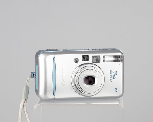 The Canon Sure Shot 115u II Date is part of the final series of Canon point-and-shoot 35mm cameras. It's an incredibly compact design.