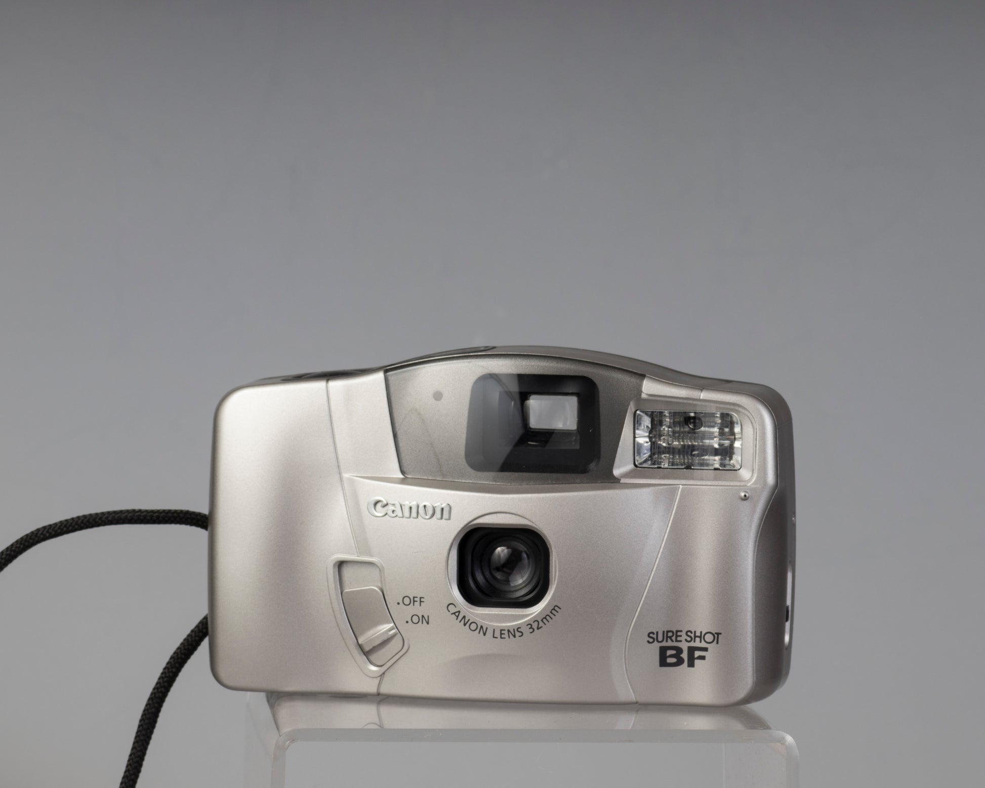 The Canon Sure Shot BF is a compact 35mm point-and-shoot with an unually large and bright viewfinder