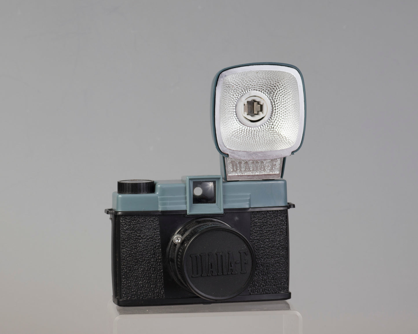 Vintage Diana F medium format camera outfit with original box and flash