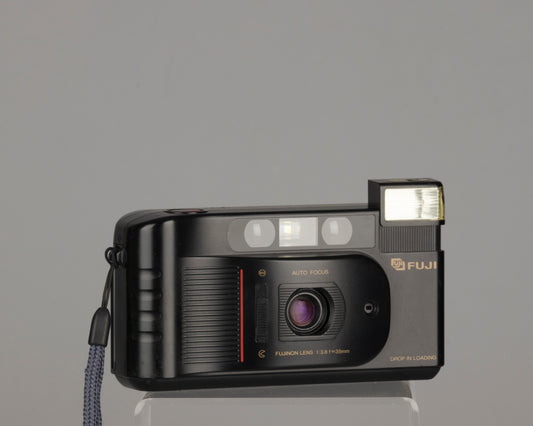 The Fuji DL-120 (aka Cardia Joy) is a 35mm film camera with a 35mm f3.8 lens and Fuji's easy 'drop in loading'