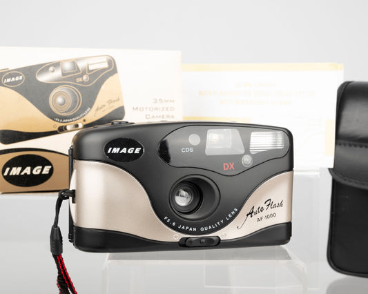 The Image AF-1000 Auto Flash is a simple 35mm motor drive camera from the 1990s