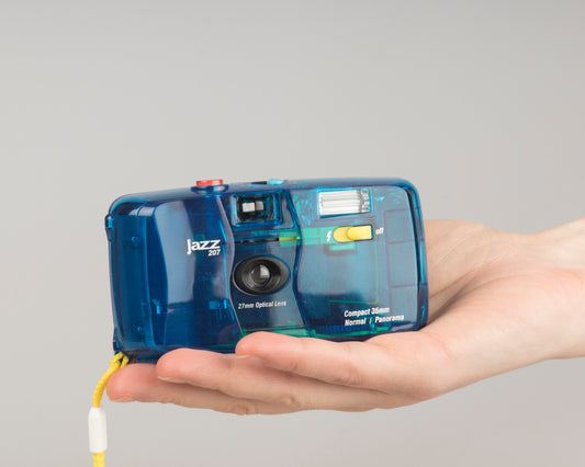 The Jazz 207 is one of the nicer 'toy camera' models we've tried. It takes 35mm film and offers an unusually wide 27mm focal length.