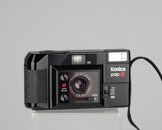 The Konica Pop-AF is a Japanese-made 35mm point-and-shoot from the 1980s featuring a 34mm f3.8 lens