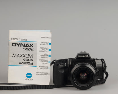 Minolta Maxxum 400si 35mm film SLR camera featuring a 28-80mm lens; shown with original manual