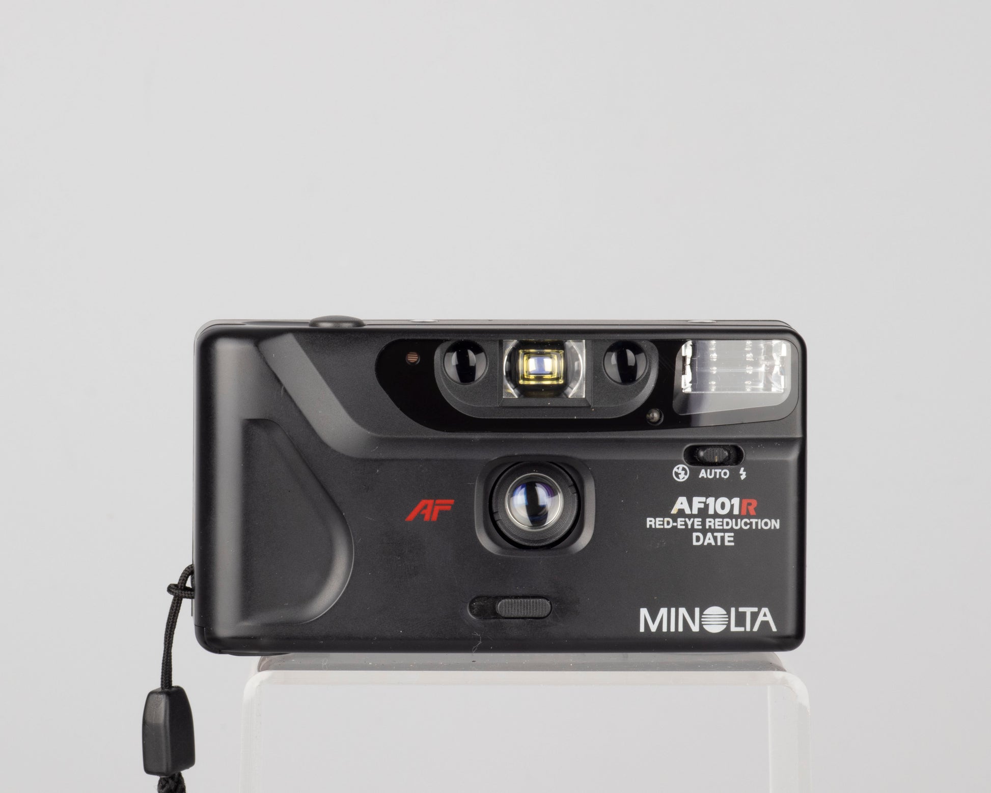 The Minolta AF101R is an elegant ultra-compact 35mm point-and-shoot camera with a 28mm wide angle lens
