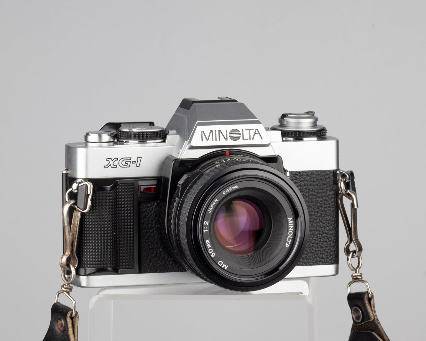 The Minolta XG-1n is a 35mm SLR camera first released in 1982. This camera features aperture priority auto-exposure.