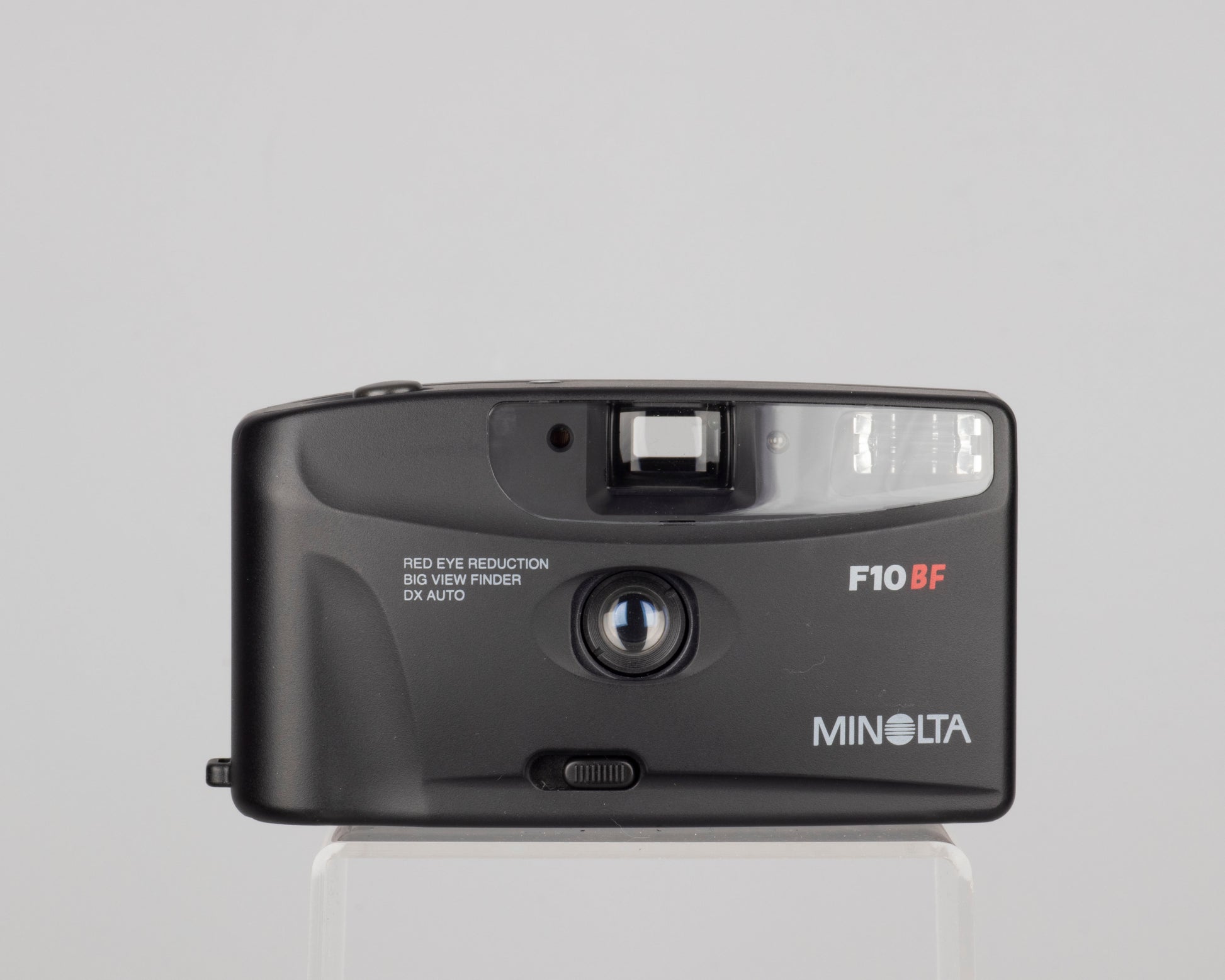 The Minolta F10BF is a simple motorized 35mm point-and-shoot from the late 1990s