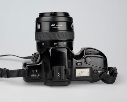 Minolta Maxxum 3xi 35mm film SLR w/ 35-70mm lens (serial 01411314)