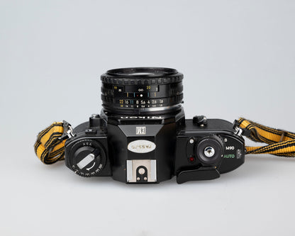 Nikon EM 35mm film SLR camera w/ 50mm f1.8 lens and 'ever-ready' case