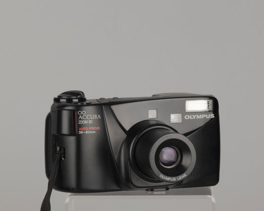 Olympus Infinity Accura Zoom 80 35mm camera with case and manual (serial 5410657)