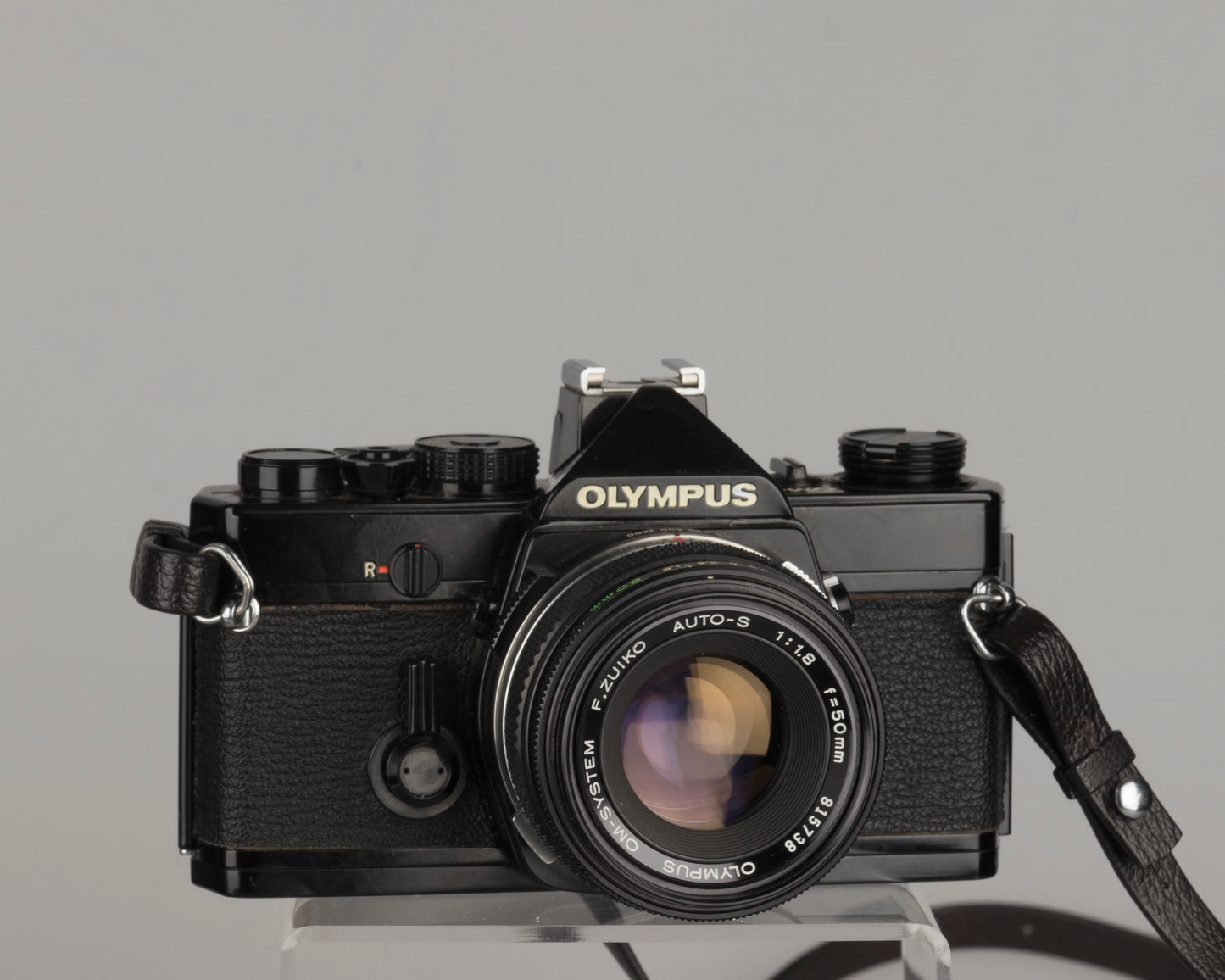 The classic Olympus OM-1; this is the original (non-MD) version in black with the F. Zuiko Auto-S 50mm f1.8 lens
