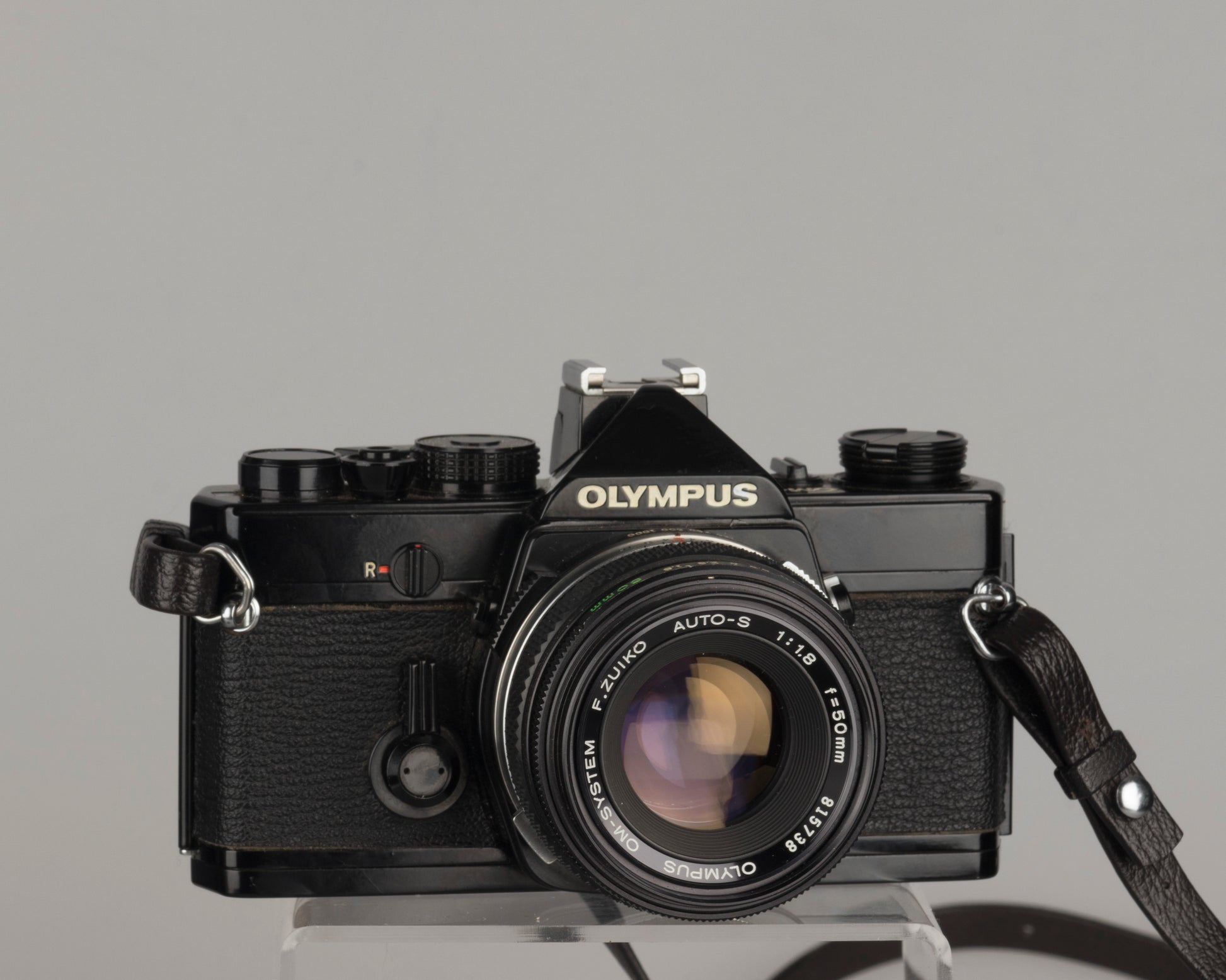 Olympus OM-1 35mm film SLR w/ Zuiko 50mm lens and ever-ready case