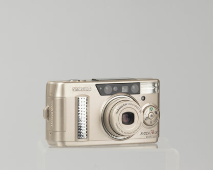 The Samsung Evoca 70 SE (the same cameras the Samsung Vega 77i and the Rollei Prego 70); a good quality ultra-portable 35mm cameras with a Schneider-Kreuznach Varioplan lens 