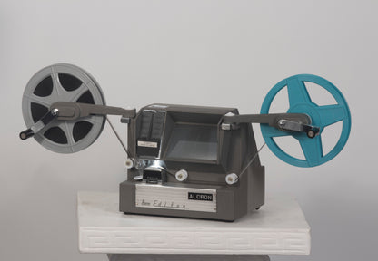 Alcron 8mm Editor shown with reels; regular 8mm movie editor/view