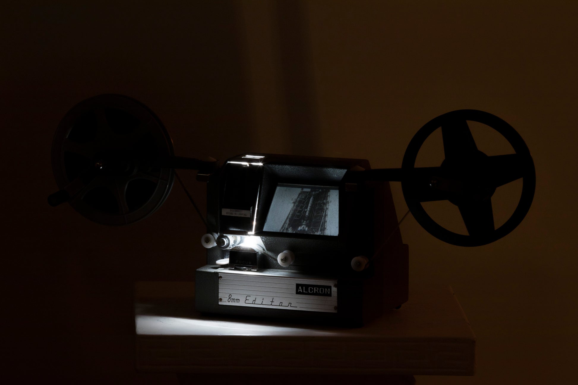 Alcron 8mm Editor Regular 8mm movie viewer/editor shown illuminated