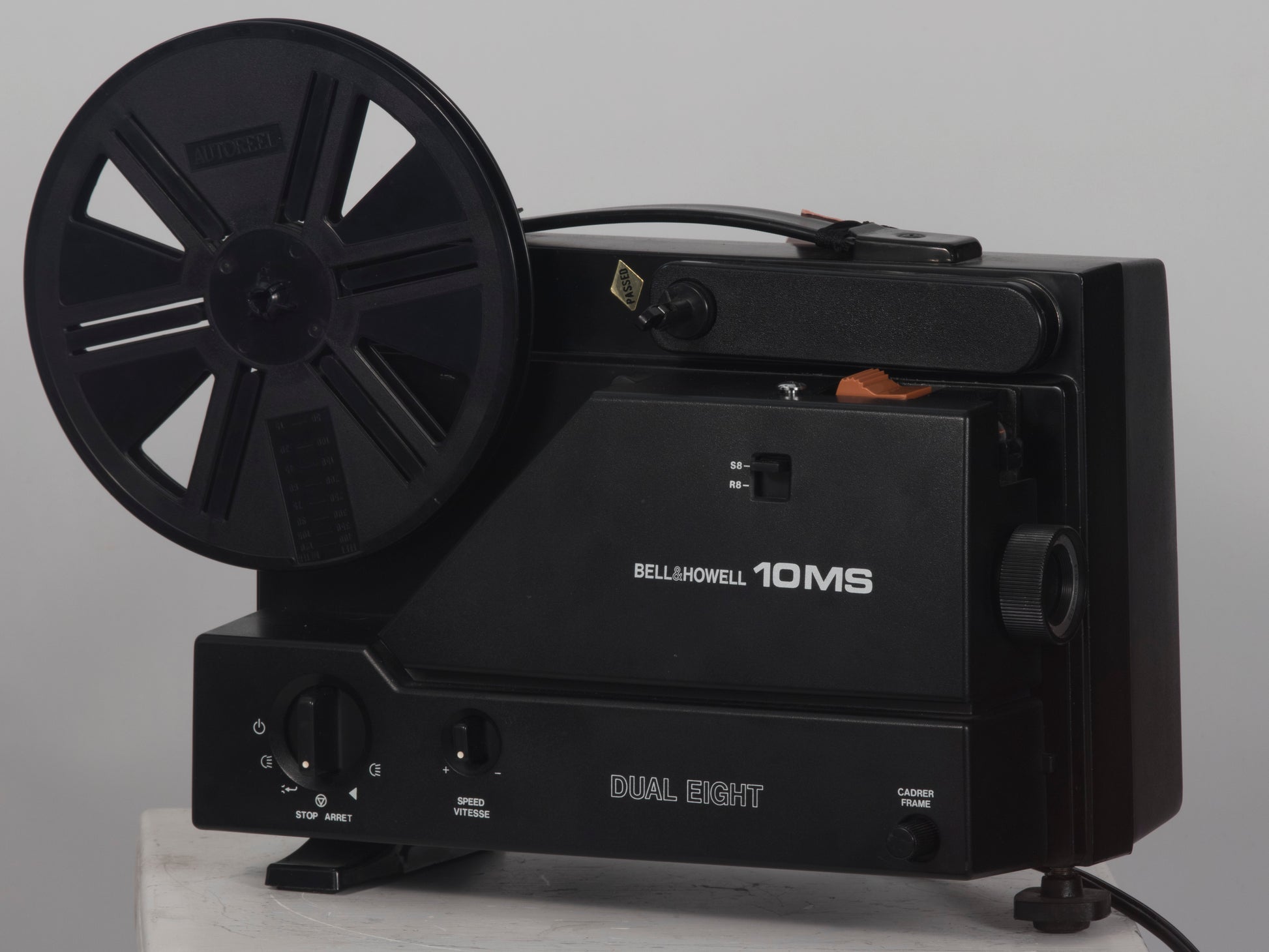 Bell and Howell 10MS dual 8mm & Super 8 projector. Shown with takeup reel.
