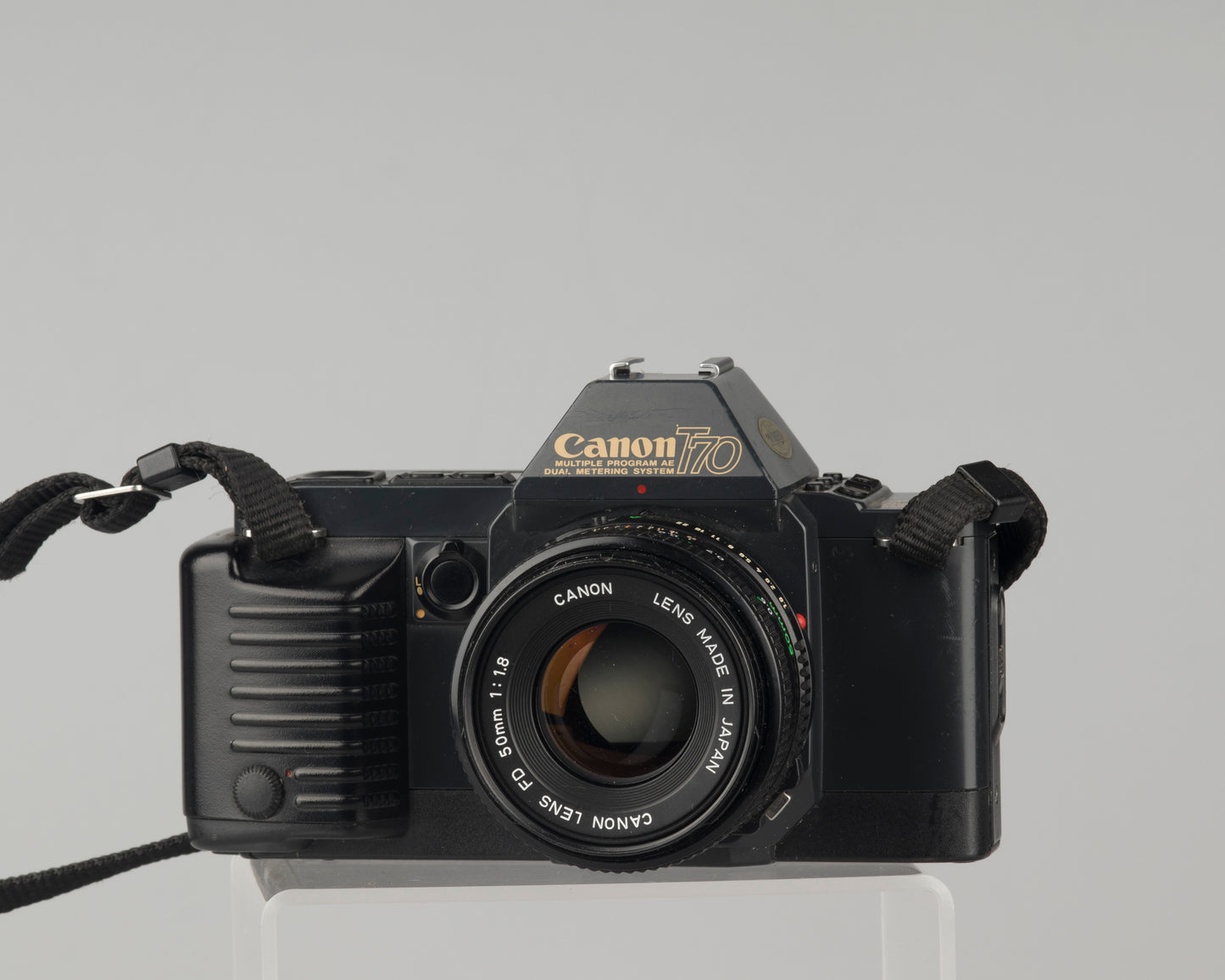 Canon T70 35 mm SLR avec objectif 50 mm f1.8 et étui toujours prêt