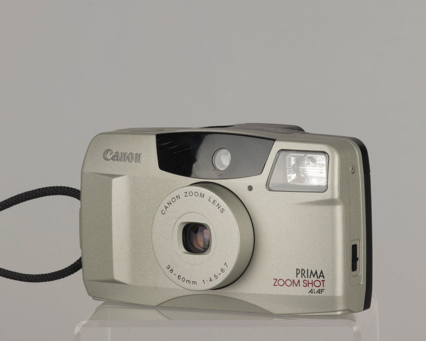 Appareil photo argentique Canon Prima Zoom Shot 35 mm avec étui