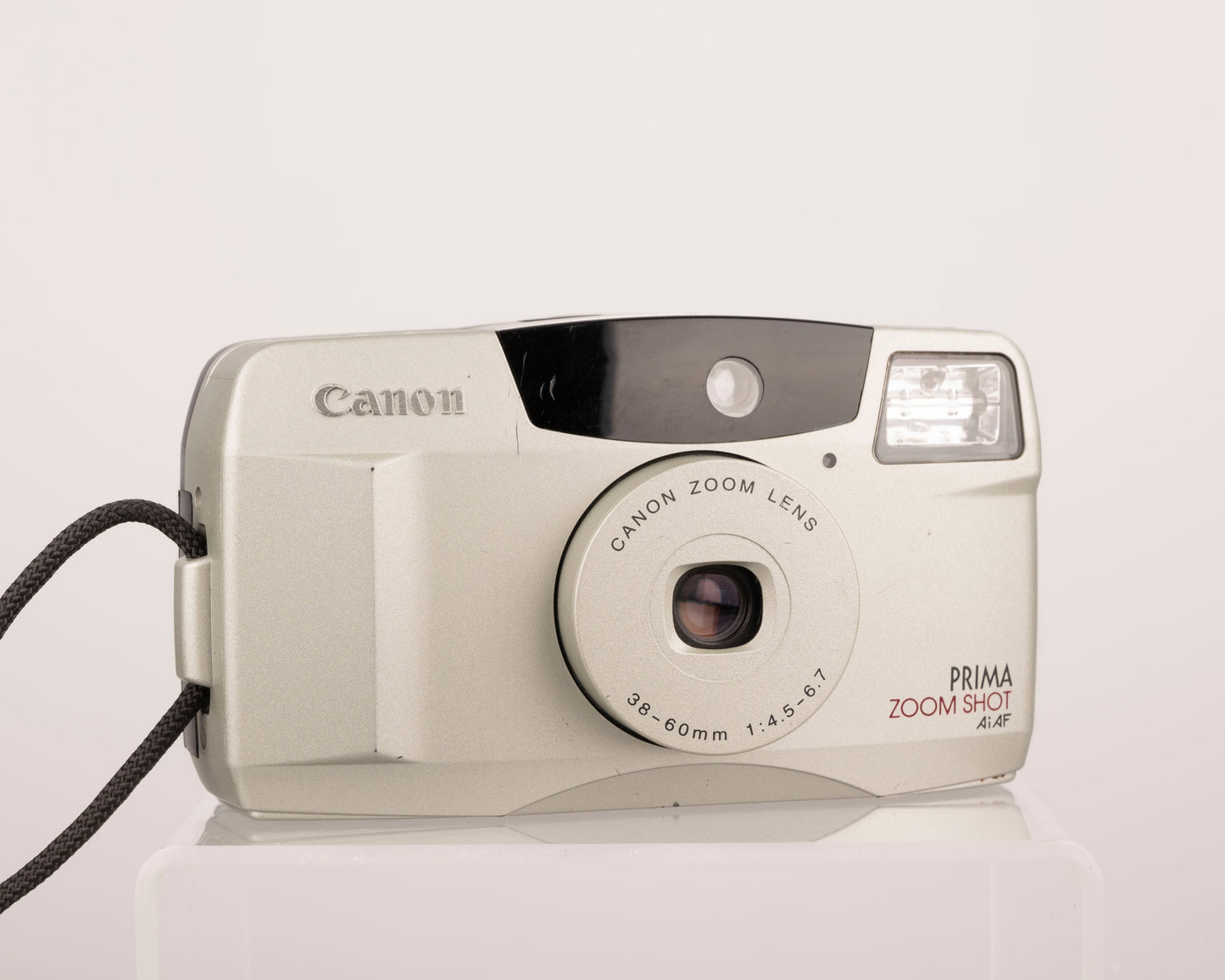 The Canon Prima Zoom Shot (aka Canon Sure Shot 60 Zoom) is an easy-to-use 35mm film point-and-shoot from the 1990s capable of very nice image quality