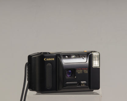 The Canon Sprint is an auto focus 35mm film point-and-shoot camera featuring a fixed 35mm f3.5 lens