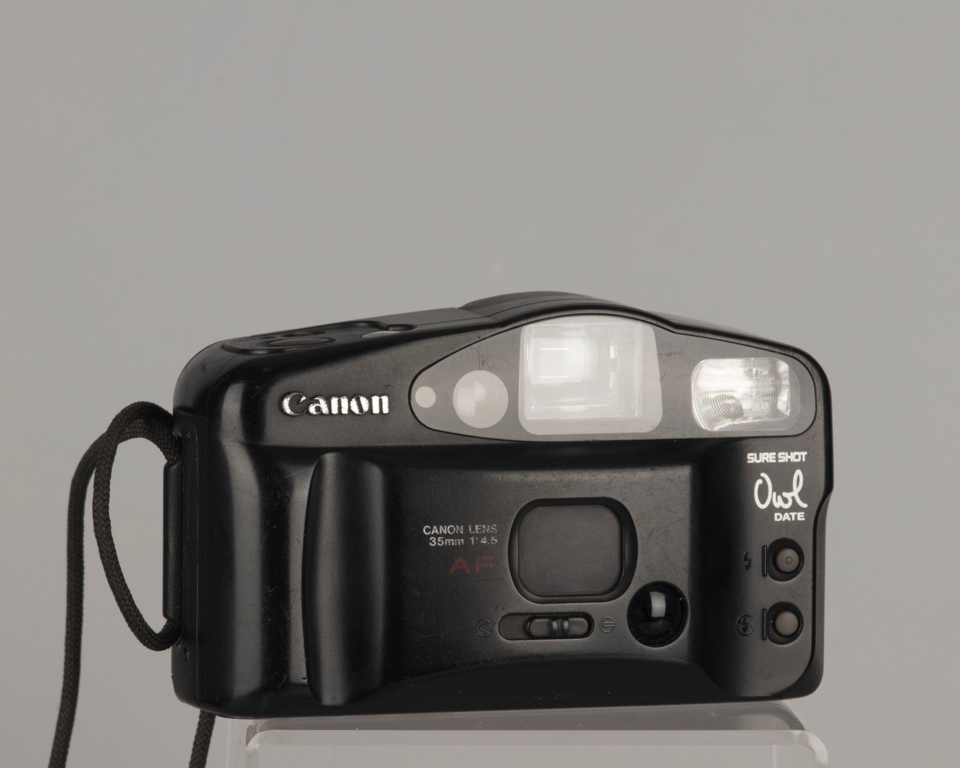 The Canon Sure Shot Owl Date is a 35mm point-and-shoot camera with a 35mm focal length lens