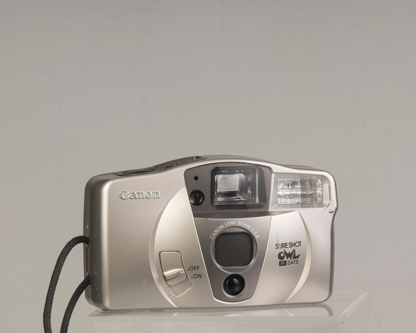 Canon Sure Shot Owl PF Date: a point-and-shoot 35mm film camera with a 35mm f/3.8 lens