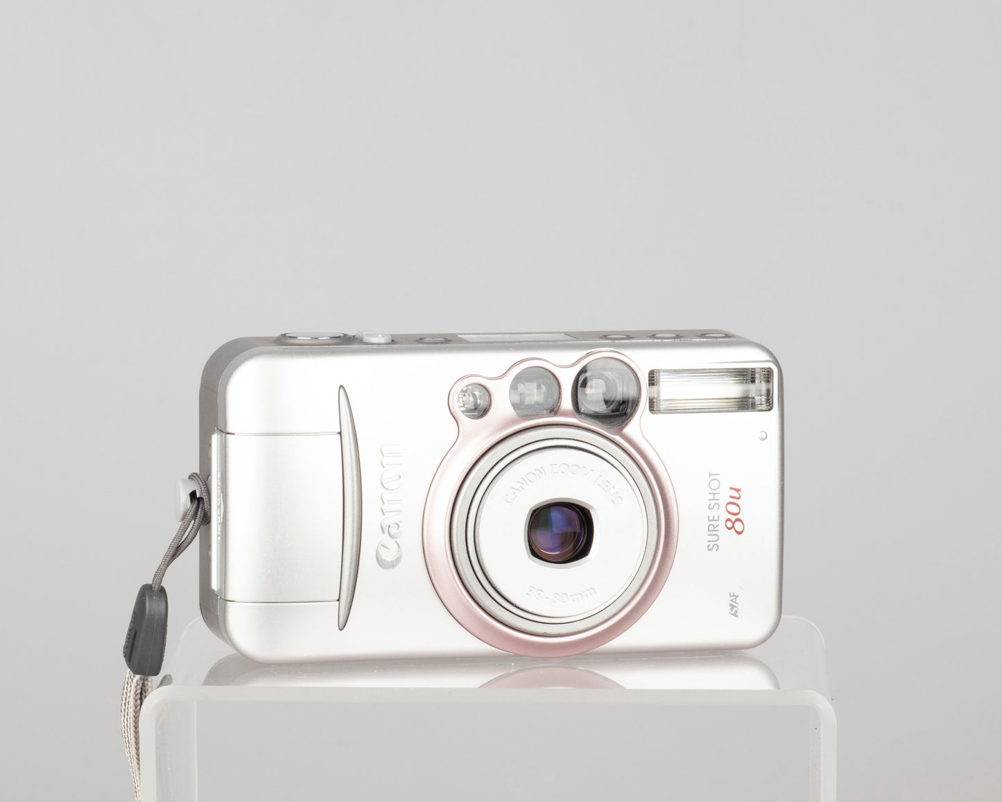 The Canon Sure Shot 80u is a quality ultra-compact 35mm point and shoot camera from the early aughts