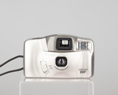 The Canon Sure Shot BF is a very easy-to-use 35mm film camera from the early aughts featuring a 32mm wide-angle lens and very bright, large viewfinder