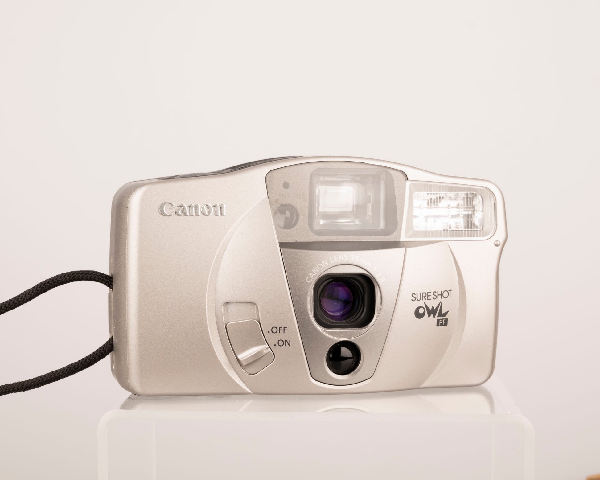 The Canon Sure Shot OWL PF is a well-designed 35mm point-and-shoot from circa-2000 featuring an unusually bright and large viewfinder