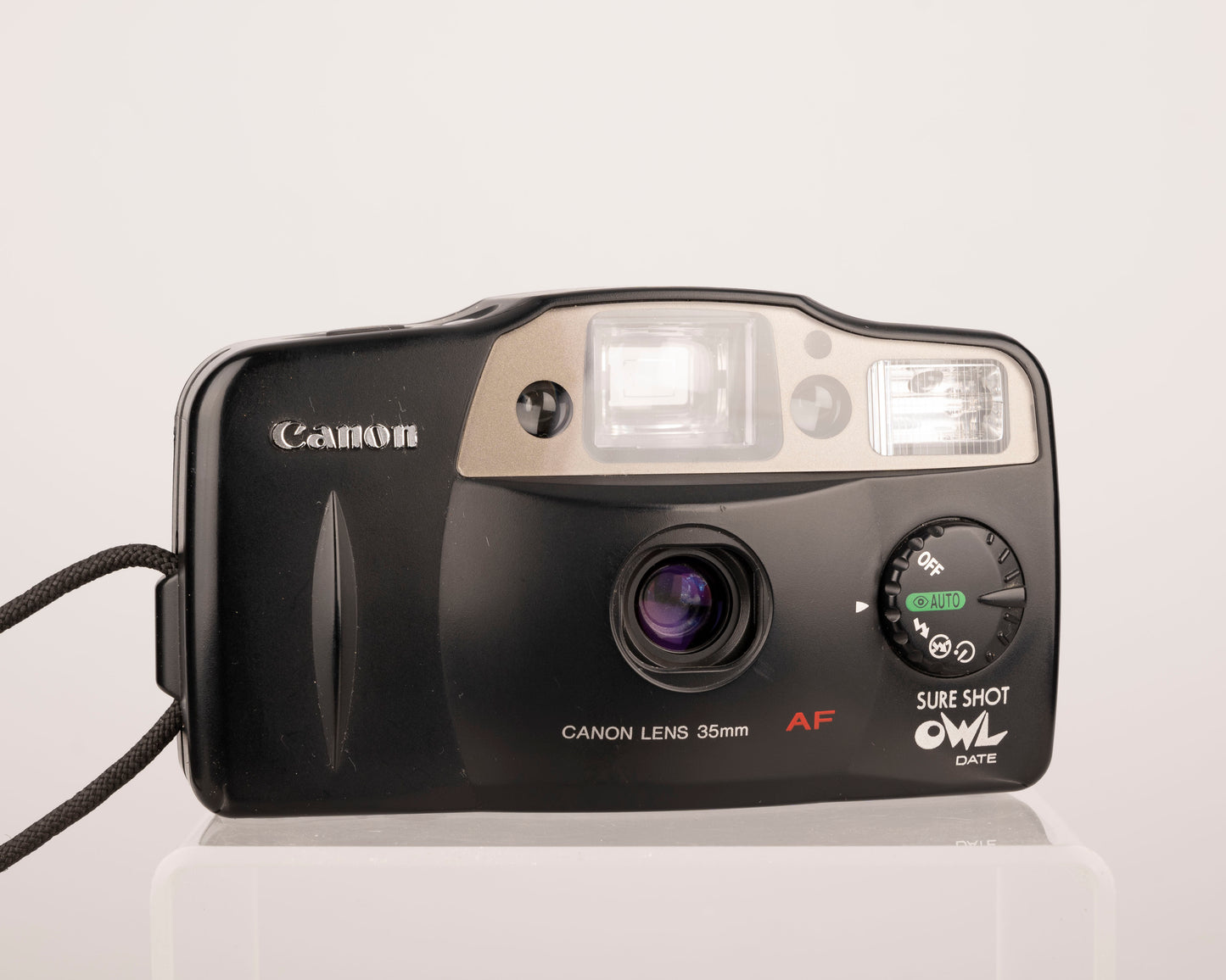 The Canon Sure Shot Owl is a very simple 35mm autofocus point-and-shoot camera from the late 1990s