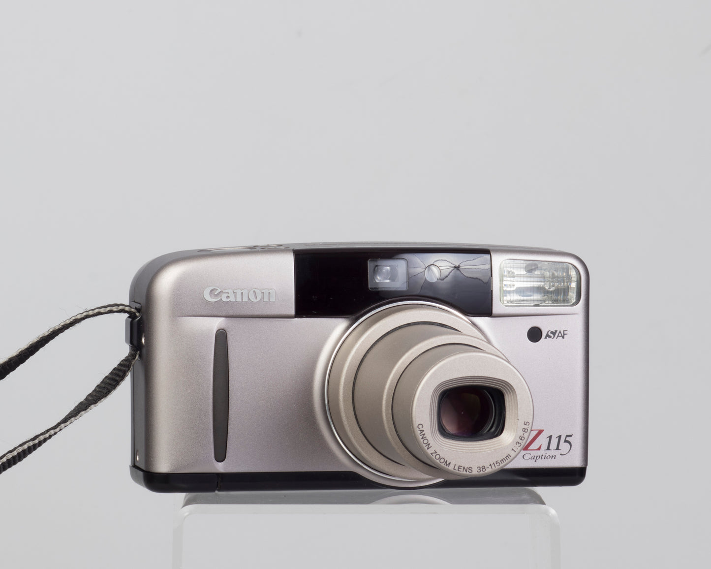 The Canon Sure Z115 was the company's top of the line 35mm point-and-shoot camera from the 1990s (shown zoomed out)