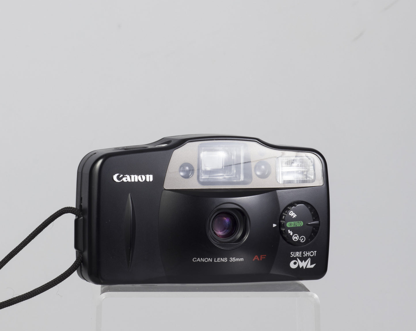 The Canon Sure Shot Owl (1997 version with dial). This 35mm compact camera was also sold as the Prima AF-8.