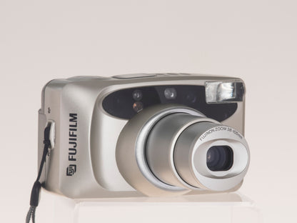 Fujifilm Discovery S1050 Zoom Date 35mm film camera front view zoomed
