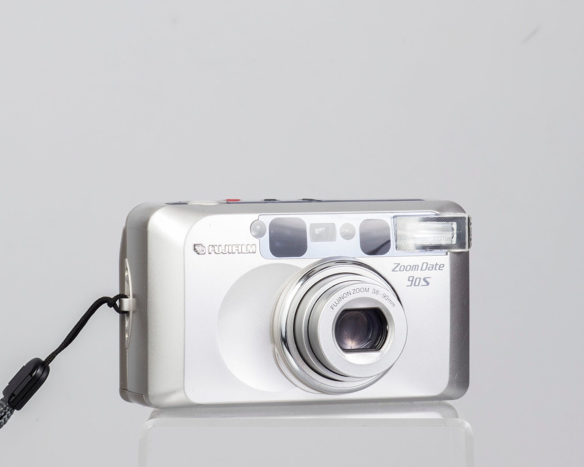 The Fujifilm Zoom Date 90S is a compact 35mm point-and-shoot camera.