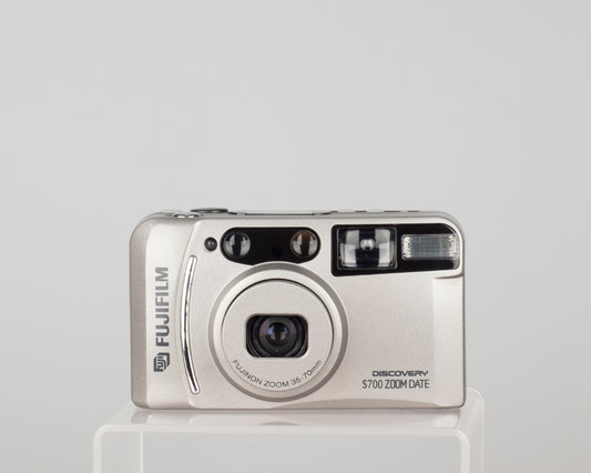 The Fujifilm Discovery S700 Zoom Date is a compact 35mm zoom camera from circa 2003